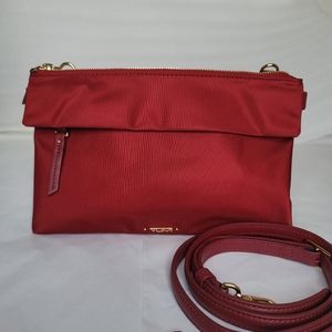 TUMI nylon cross body bag.